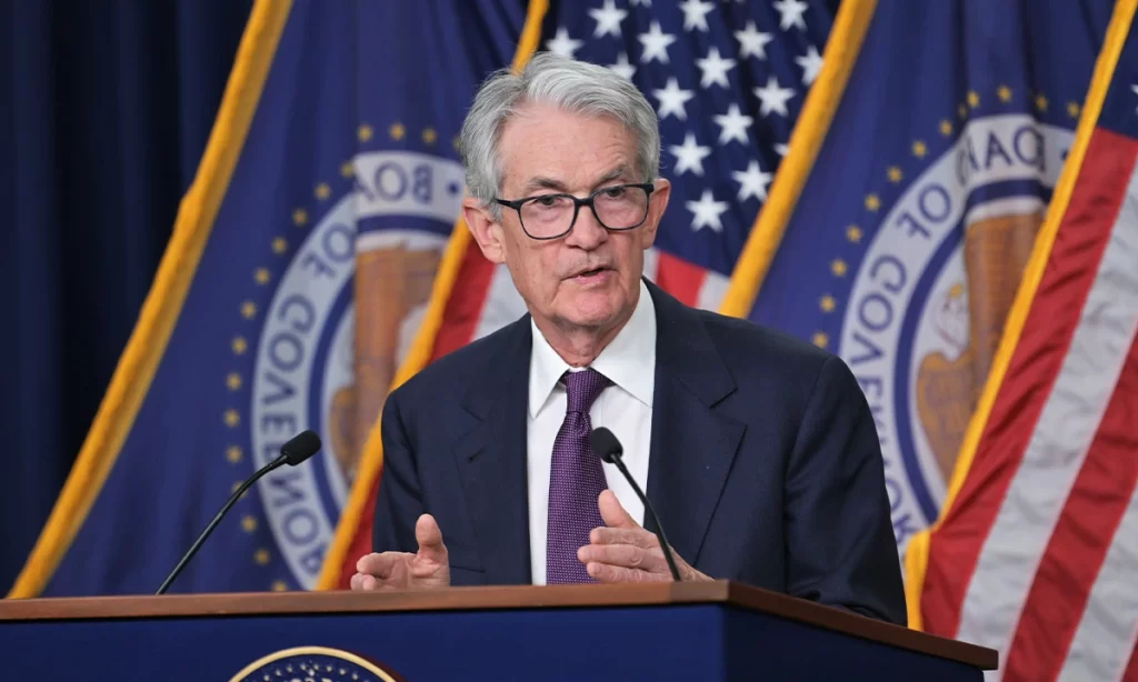 Jerome Powell, Chairman of the Federal Reserve, speaking at a Fed Meeting about monetary policy and interest rates.