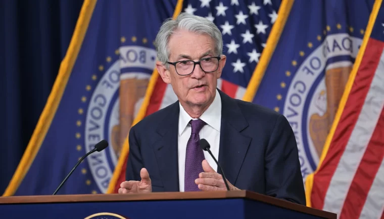 Jerome Powell, Chairman of the Federal Reserve, speaking at a Fed Meeting about monetary policy and interest rates.